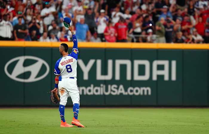 Aug 19, 2023; Cumberland, Georgia, USA; Atlanta Braves left fielder Eddie Rosario (8) acknowledges the fans after his two run home run against the San Francisco Giants during the eighth inning at Truist Park.